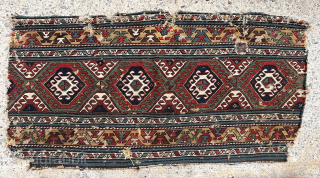 Old flat woven fragment. Likely a mafrash side panel with good age, old colors and an eye catching yellow border. Cotton whites. 19th c. 20” x 39”      