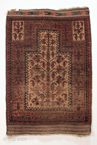 Antique baluch prayer rug. Nice older piece in "as found" condition. All good natural colors. Dirty with some areas of heavy wear and some old latex for non skid on part of  ...