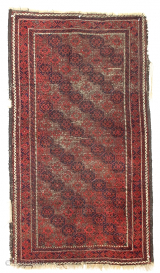 Antique baluch rug. Iconic lattice design. Fiery reds. Quite sculptural with heavy black oxidation. All natural colors. Could use a wash. 19th c.  2'11" x 5'2"      