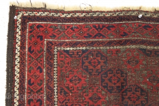 Antique baluch rug. Iconic lattice design. Fiery reds. Quite sculptural with heavy black oxidation. All natural colors. Could use a wash. 19th c.  2'11" x 5'2"      