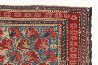 antique little kuba seichour rug with an iconic floral array on a beautiful light blue ground. "as found", overall fair pile with almost entirely oxidized browns. All natural colors including an attractive  ...