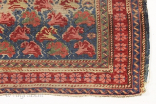 antique little kuba seichour rug with an iconic floral array on a beautiful light blue ground. "as found", overall fair pile with almost entirely oxidized browns. All natural colors including an attractive  ...