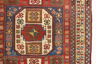 antique unusual karachopf kazak in good condition. Found in a New England barn. Beautiful large caucasian rug with all natural colors. Pretty tomato red ground with lots of light blue, richgreen and  ...