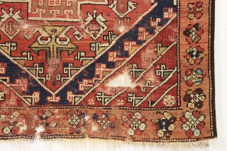 early small west anatolian rug. Old enough to have presence. All good colors. Damaged but complete. Waiting to be mounted or restored properly. Good age. First half 19th c. 4' x 4'9"  ...