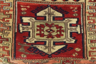 antique east anatolian kurdish rug fragment with archaic drawing and beautiful fleecy wool. All good old natural colors. Lovely soft purples and greens. Original two ends sewn together across the center. Some  ...