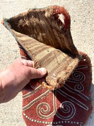 Old central Asian felt bag, presumably a holder of poles or arrows. Folder and bound on one side as shown. Fair condition with a few small old moth nibbles. Only one I  ...