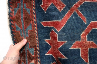 Antique caucasian Avar rug with iconic design. Overall mostly even low pile with scattered small old repairs, not very well done. Original selvages. Ends rough. Colors appear natural other than some bright  ...