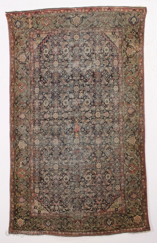 Antique farraghan rug. A true older farraghan rug with a lovely apple green border. In about as abused condition as possible and still be intact. Allover wear, ends crudely rewoven, etc. A  ...