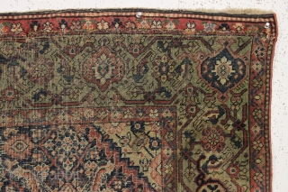 Antique farraghan rug. A true older farraghan rug with a lovely apple green border. In about as abused condition as possible and still be intact. Allover wear, ends crudely rewoven, etc. A  ...