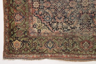 Antique farraghan rug. A true older farraghan rug with a lovely apple green border. In about as abused condition as possible and still be intact. Allover wear, ends crudely rewoven, etc. A  ...