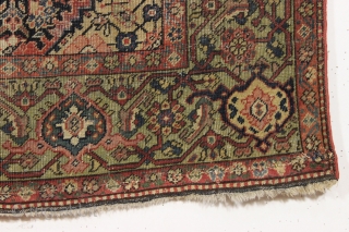 Antique farraghan rug. A true older farraghan rug with a lovely apple green border. In about as abused condition as possible and still be intact. Allover wear, ends crudely rewoven, etc. A  ...