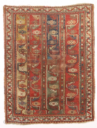antique little turkish melas rug. Older example of the type. "as found", very dirty with areas of wear and edge loss as shown. Lovely all natural colors including a fine old yellow  ...