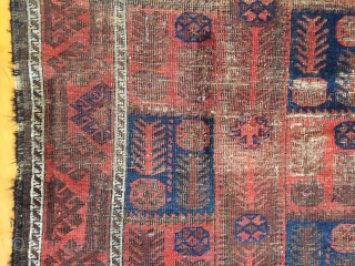 Old Baluch rug. Unusual and interesting design. Good colors. As found, in poor condition and priced accordingly. 19th c. 3'1" x 5'2"           