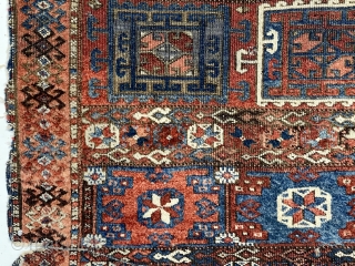 Antique Kurdish divan cover. Older example of this well known type. Mostly decent pile. All good natural colors featuring lovely blues, deep greens and a rich apricot orange. Scattered wear, creases, and  ...