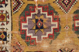 Early yellow ground Anatolian rug fragment. Remnant original selvage on both sides. Genuine art. Needs mounting. 18th c. 3'8" x 3'7"            