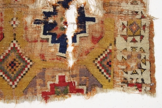 Early yellow ground Anatolian rug fragment. Remnant original selvage on both sides. Genuine art. Needs mounting. 18th c. 3'8" x 3'7"            
