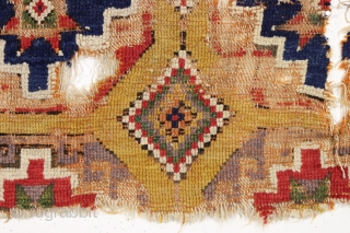 Early yellow ground Anatolian rug fragment. Remnant original selvage on both sides. Genuine art. Needs mounting. 18th c. 3'8" x 3'7"            