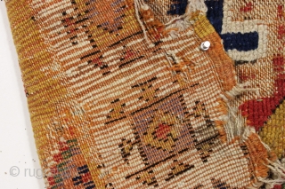 Early yellow ground Anatolian rug fragment. Remnant original selvage on both sides. Genuine art. Needs mounting. 18th c. 3'8" x 3'7"            