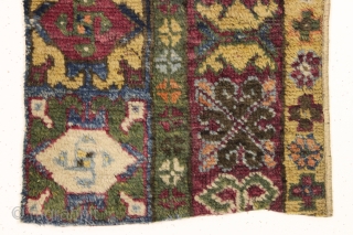 old little mystery pile rug fragment. Nice cloudband elements. Beautiful yellows and greens. Could use a wash. 18" x 36"             