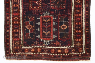 antique baluch rug with an interesting and unusual design in mostly thick high pile with a few knots of light colored silk in the border. Possibly a transitional piece with the drawing  ...