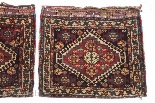 pair of antique south persian bags fresh from a local North Shore home. Both bags complete with original backs, closure tabs and loops. Both pieces in good pile with all natural colors.  ...