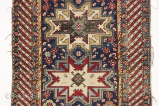 antique caucasian rug, probably shirvan, with bold Lesghi stars and an eye catching border. All natural colors featuring lovely greens and lots of a good old yellow. As found, not restored, with  ...