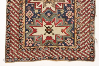 antique caucasian rug, probably shirvan, with bold Lesghi stars and an eye catching border. All natural colors featuring lovely greens and lots of a good old yellow. As found, not restored, with  ...