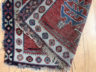 What remains of an early Avar Caucasian rug. Breathtaking bold field and lovely borders. Heavily damaged with tears, edge roughness  and wear. Not for restoration but simply appreciation. Old. 37” x  ...