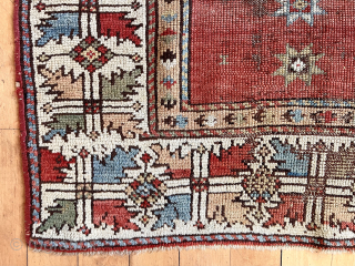 Early Anatolian village prayer rug. Eye catching border. Lovely natural colors featuring lots of soft greens. Crude repairs to very damaged center.  Needs a wash. Good age, mid 19th c or  ...