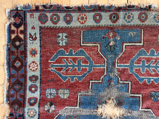 What remains of an early Avar Caucasian rug. Breathtaking bold field and lovely borders. Heavily damaged with tears, edge roughness  and wear. Not for restoration but simply appreciation. Old. 37” x  ...