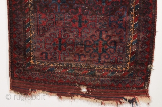 Old baluch prayer rug with rich deep color and thick high fleecy pile. Overall mostly good high pile. Original selvages. Original flat woven end finish. Few small holes, moth nibbles. All natural  ...