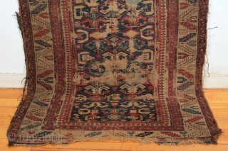 Antique caucasian sumak rug with good drawing. "as found"  Very rough. Very dirty. Damaged as shown. Structurally sound.  Good age, ca.1875 or earlier. 3' 4" x 9' 4". 
  