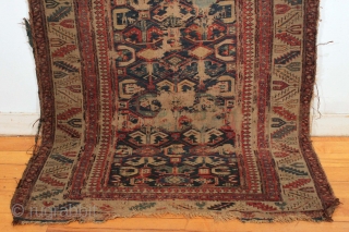 Antique caucasian sumak rug with good drawing. "as found"  Very rough. Very dirty. Damaged as shown. Structurally sound.  Good age, ca.1875 or earlier. 3' 4" x 9' 4". 
  