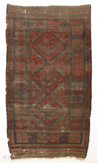 Antique baluch. Interesting large scale design. Nice reds. If wear is age then this one is ancient. Many many tiny moth nibbles and tiny holes, and hard to tell the front from  ...