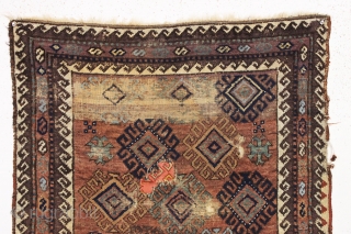 antique baluch rug. Not all there but what is there is very nice. All natural colors. Good age, ca. 1875 or earlier. 3'2" x 5'3"        