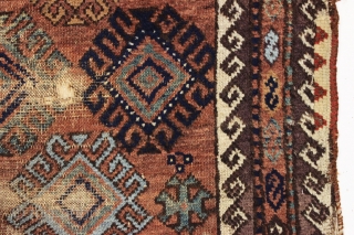 antique baluch rug. Not all there but what is there is very nice. All natural colors. Good age, ca. 1875 or earlier. 3'2" x 5'3"        