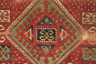 antique kazak rug. Fresh New England find. Strong design and all natural colors featuring nice yellows and greens. As found, very dirty with heavy wear and scattered damage as shown. Has good  ...