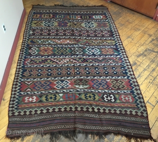 Antique south Persian kelim. All natural colors featuring nice yellows and rich greens. As found, very dirty with mostly good condition but a few small rough spots as shown. Will look terrific  ...