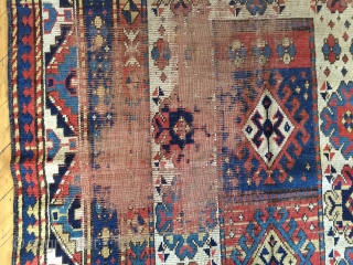 Antique large Kazak rug. Unusual and bold design. As found, in need of restoration. 4'8" x 8'10" 19th c.              