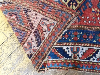 Antique large Kazak rug. Unusual and bold design. As found, in need of restoration. 4'8" x 8'10" 19th c.              