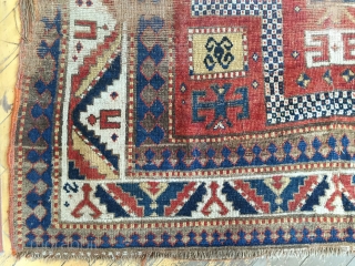 Antique large Kazak. Karachopf variant. As found, very dirty and in need of extensive restoration. 19th c.  5'2" X 7'7"            