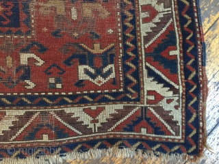 Antique little Kazak rug. Nice design and all good colors but with wear and damage as shown. Very dirty. 19th c. 3'9" X 5'9"         