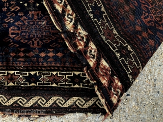 Antique large Baluch bagface with an attractive and rare design. Original selvages and remnant fancy ends. Very low pile with wear as shown. Natural colors. As found, in need of a good  ...