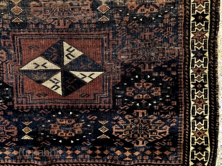 Antique large Baluch bagface with an attractive and rare design. Original selvages and remnant fancy ends. Very low pile with wear as shown. Natural colors. As found, in need of a good  ...