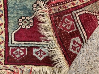 Antique Anatolian yastik in fair condition with very nice greens. Mostly decent pile with some light to moderate wear as shown. Original selvages. Natural colors including cochineal reds and real greens. As  ...