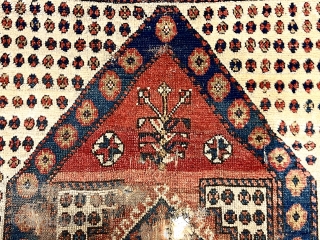 Antique little tribal prayer rug, probably monastir, with eye catching archaic drawing. Rough condition with an assortment of tears, holes, gouges and wear. Some decent pile. Characteristic monastir soft palette. Could use  ...
