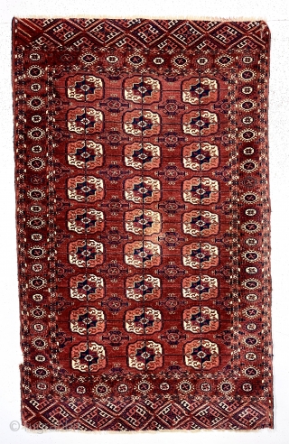 Older little tekke rug with good quality and soft lustrous wool. Nice rounded main guls and attractive minors. Overall mostly fair low pile with scattered wear as shown. A couple small spots  ...