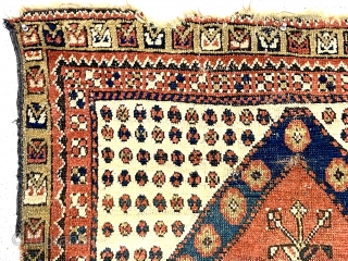 Antique little tribal prayer rug, probably monastir, with eye catching archaic drawing. Rough condition with an assortment of tears, holes, gouges and wear. Some decent pile. Characteristic monastir soft palette. Could use  ...