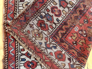 Spring cleaning. Old northwest Persian or Kurdish rug. Yes it’s very worn. Been here long time. I like the charming border with what I see as bird houses (I may be alone  ...