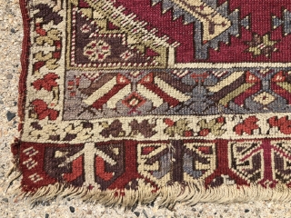 Antique Anatolian yastik. Nicely drawn “saz leaf” design with overall good even low pile. Likely Kersehir. Some heavy brown oxidation. Original selvages, a bit rough. Ends unraveling. Very colorful with no dye  ...